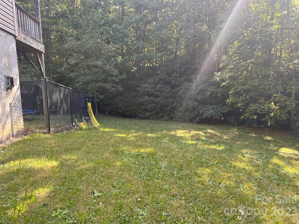 42 Bear Trail Fairview, NC 28730 - Photo 5 of 37 a view of a backyard