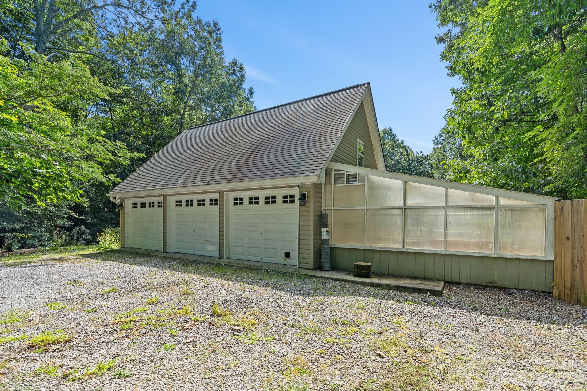 42 Bear Trail Fairview, NC 28730 - Photo 7 of 37 a house with a yard