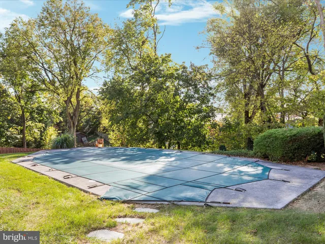 a view of a house with swimming pool