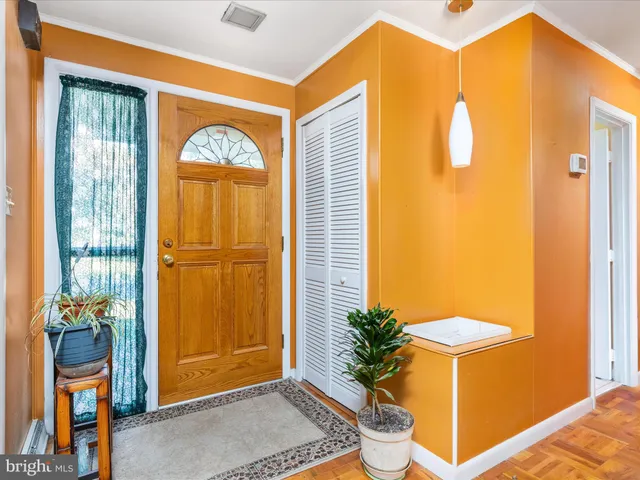 a porch with swimming pool and a yard