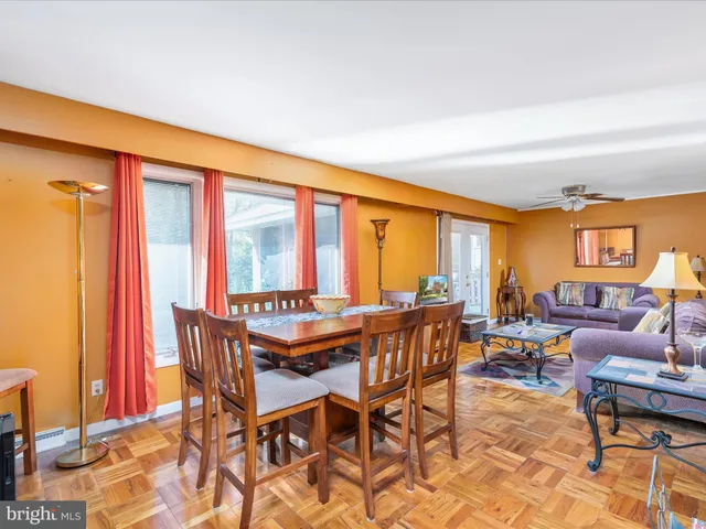 a view of a backyard with swimming pool