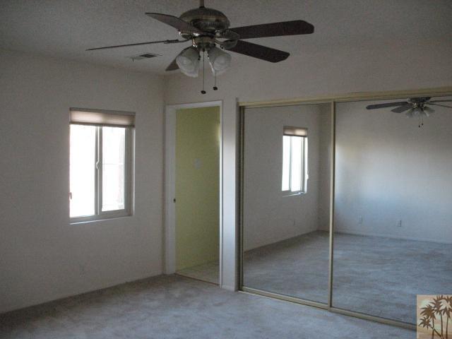 67145 San Ardo Road Desert Hot Springs, CA 92240 - Photo 16 of 20 a view of an empty room with a window