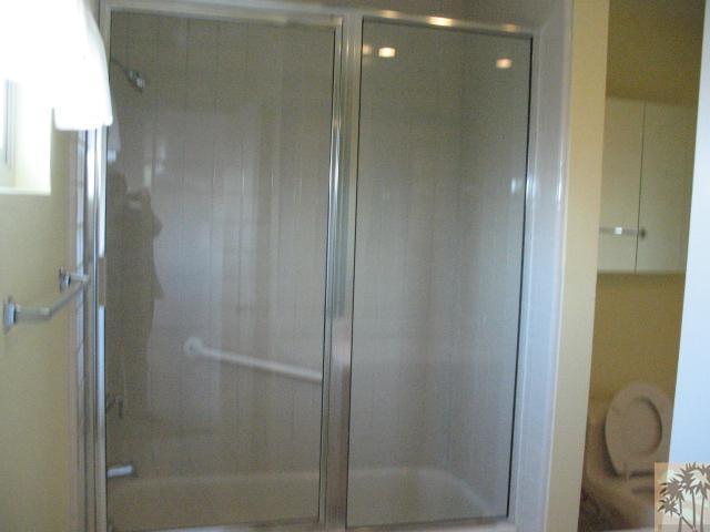 67145 San Ardo Road Desert Hot Springs, CA 92240 - Photo 18 of 20 a bathroom with a shower