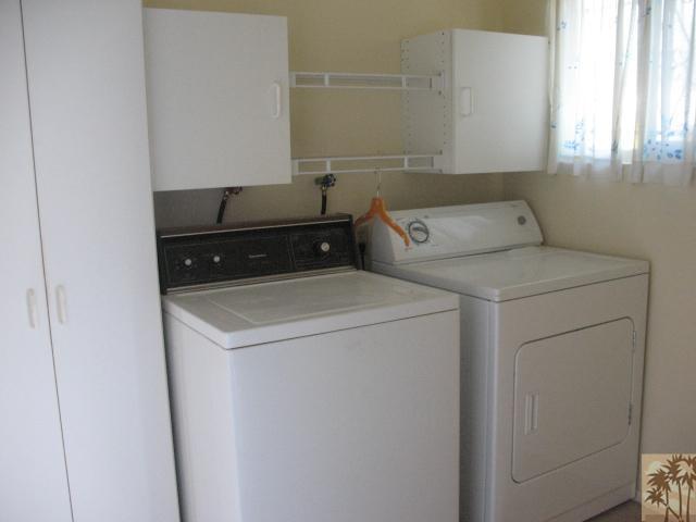 67145 San Ardo Road Desert Hot Springs, CA 92240 - Photo 19 of 20 a utility room with dryer and washer
