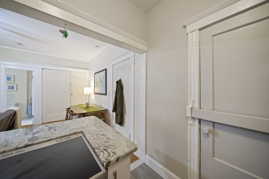 74 Fenway, Unit 35 Boston, MA 02115 - Photo 7 of 15 a view of a kitchen from the hallway