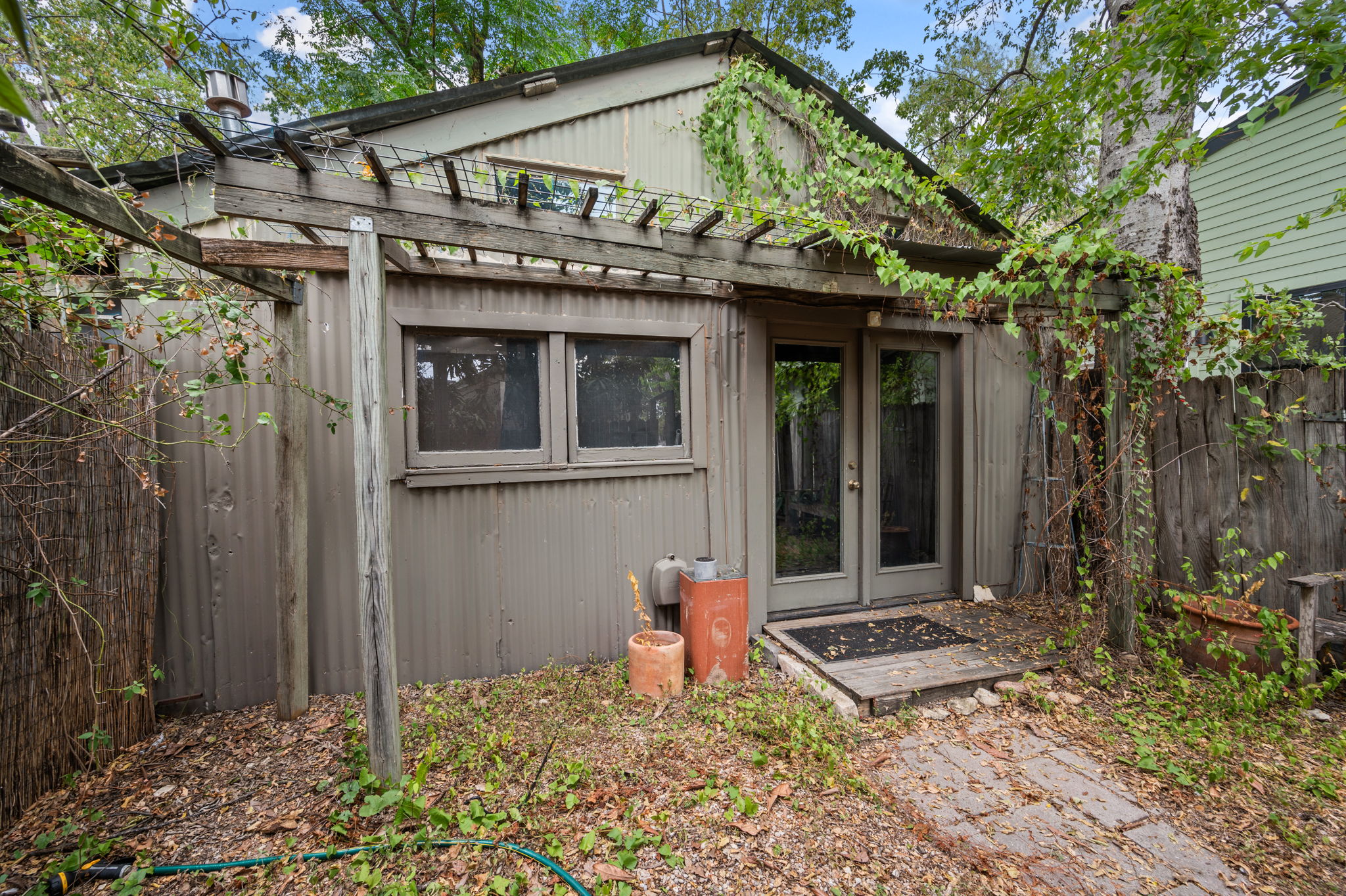 820 Stark Street Austin, TX 78756 - Photo 12 of 19 a front view of a house with garden