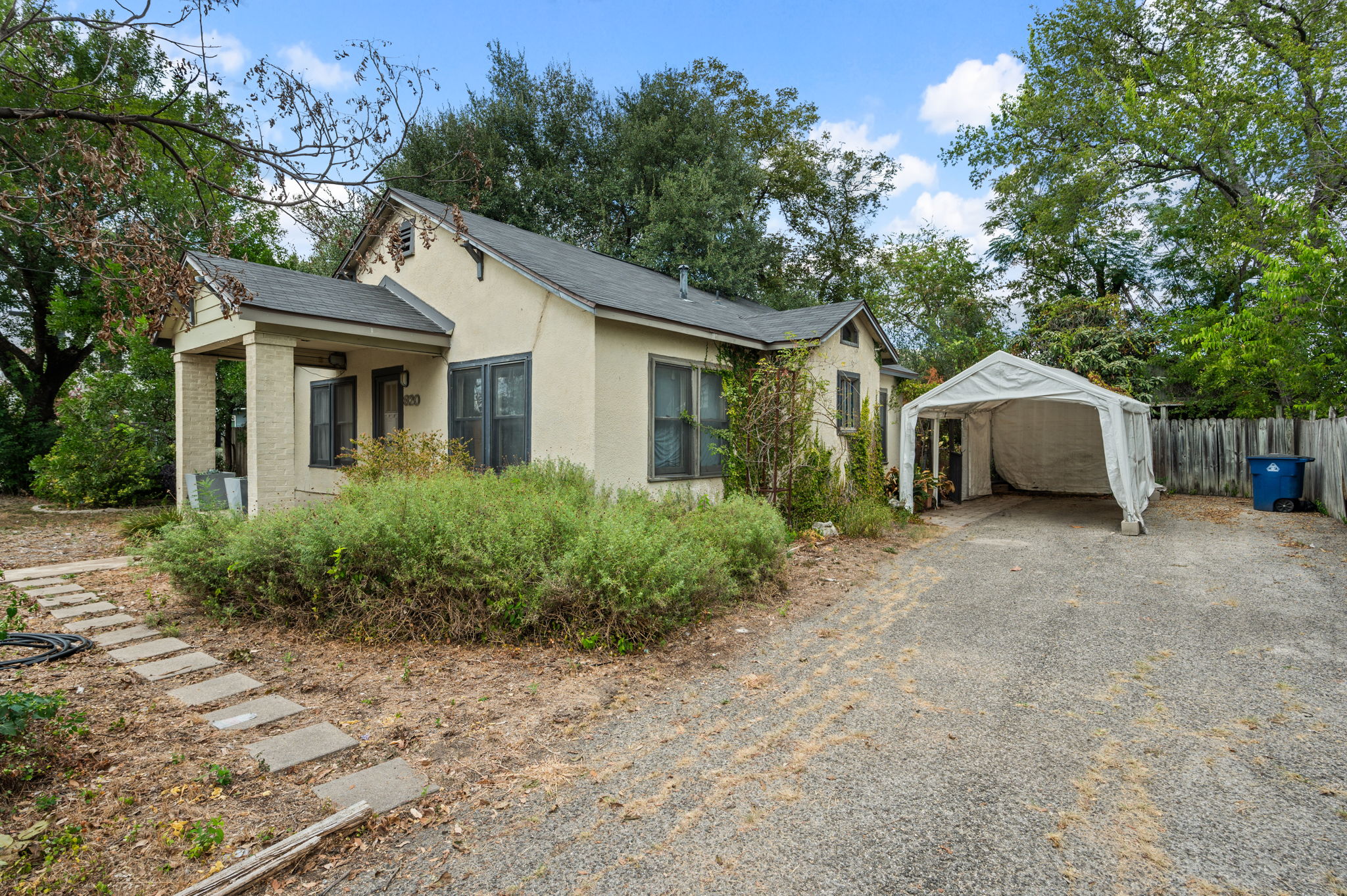 820 Stark Street Austin, TX 78756 - Photo 8 of 19 a front view of house with yard and trees around