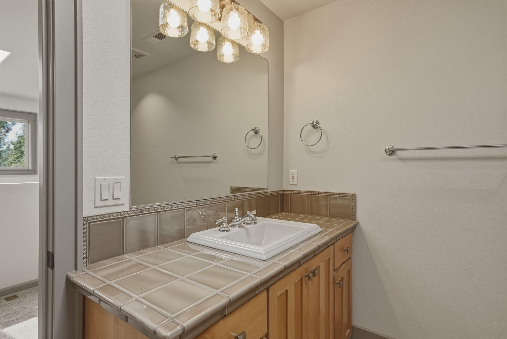 240 Northwest Skyliner Summit Loop Bend, OR 97703 - Photo 57 of 77 This bathroom can be accessed from the hallway.