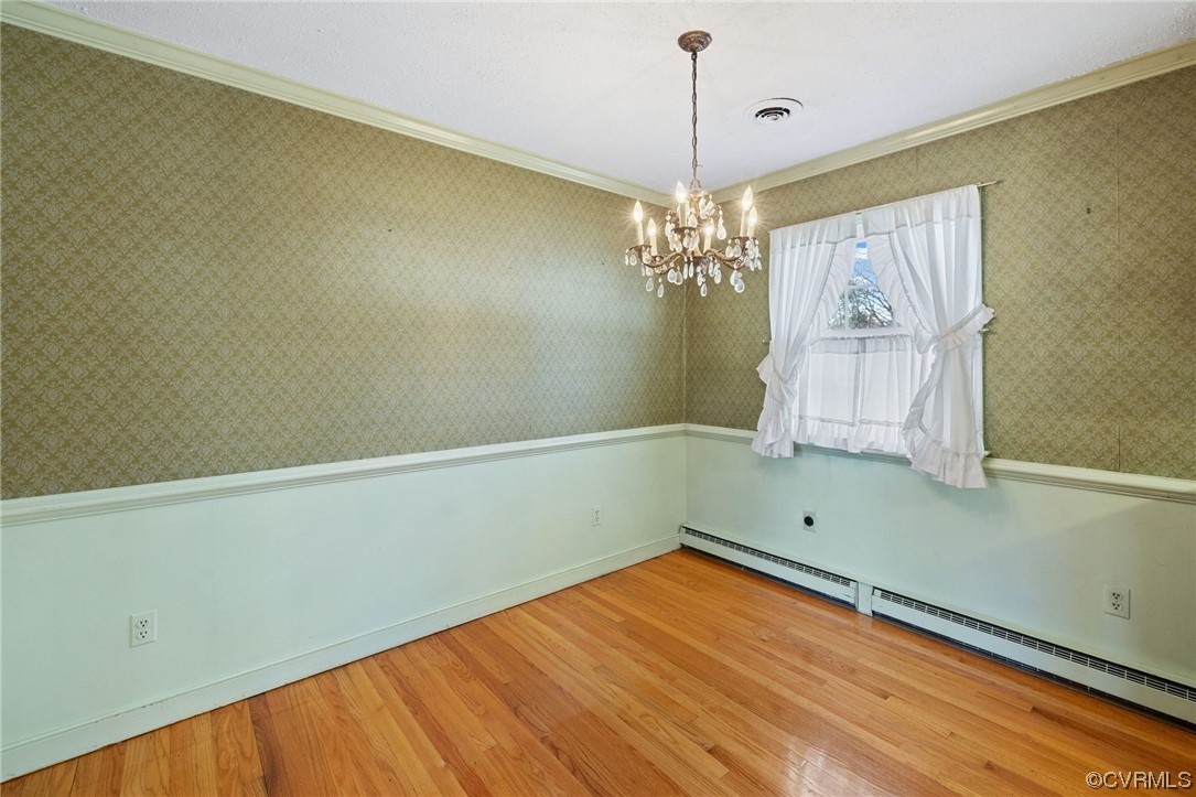 2408 Coxendale Road Chester, VA 23831 - Photo 15 of 26 a view of room with window and wooden floor