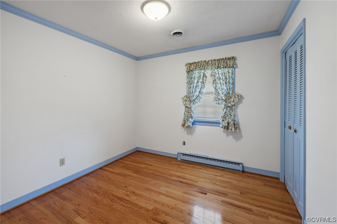 2408 Coxendale Road Chester, VA 23831 - Photo 18 of 26 a view of empty room with wooden floor