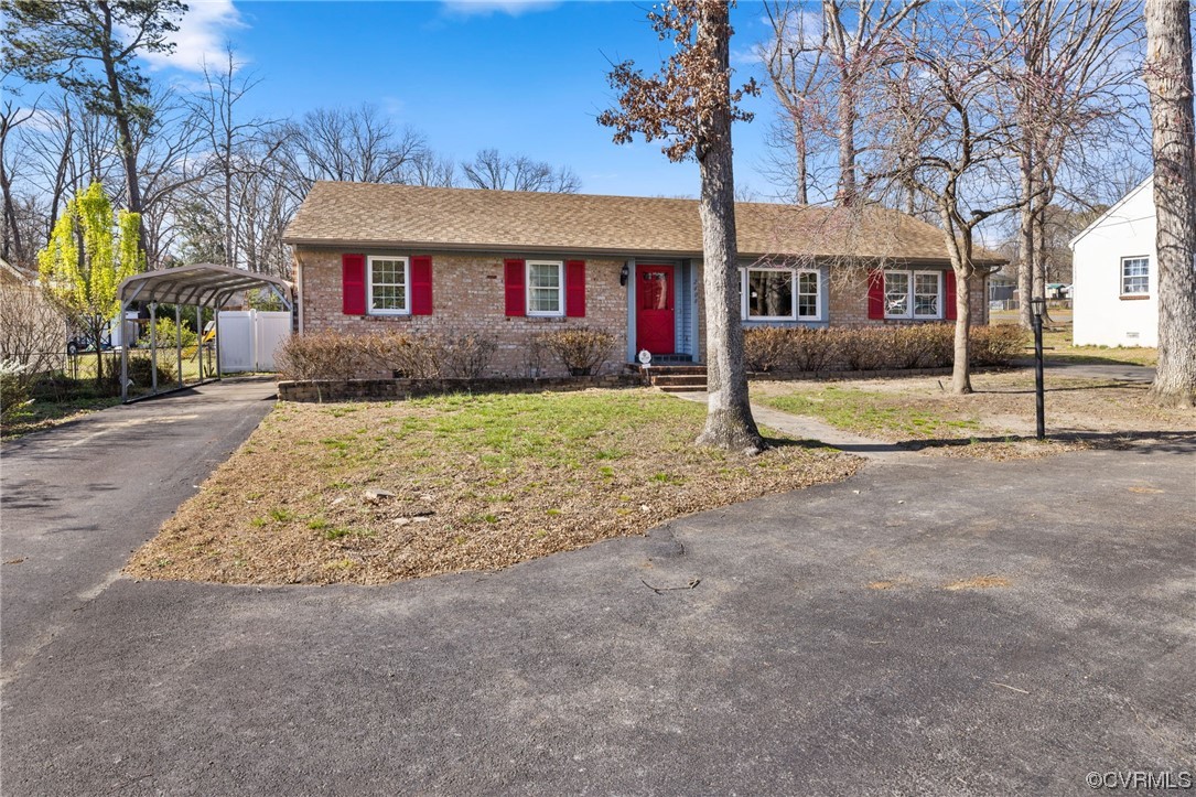2408 Coxendale Road Chester, VA 23831 - Photo 2 of 26 a view of a house with a street