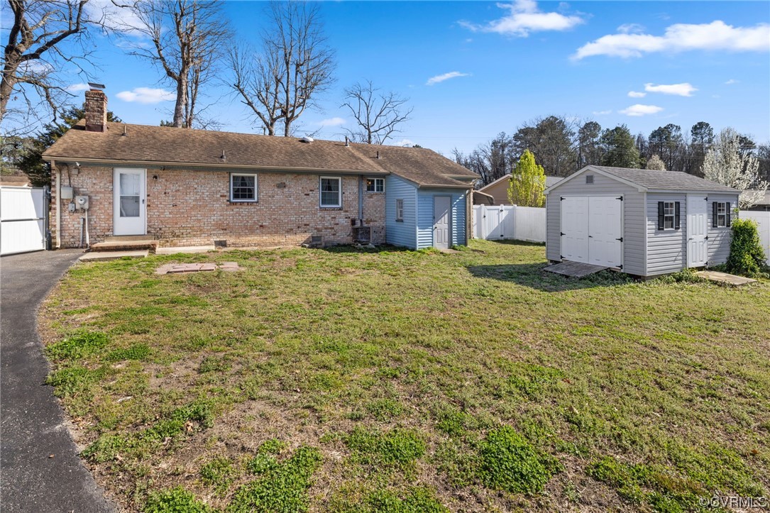 2408 Coxendale Road Chester, VA 23831 - Photo 24 of 26 a front view of a house with a yard