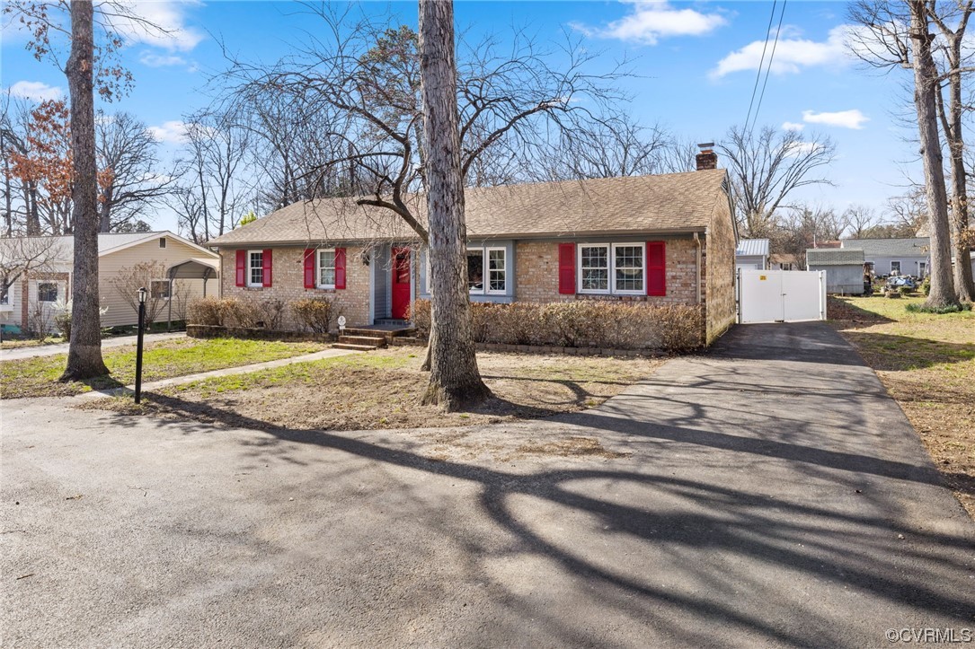 2408 Coxendale Road Chester, VA 23831 - Photo 3 of 26 a view of a yard in front of a building