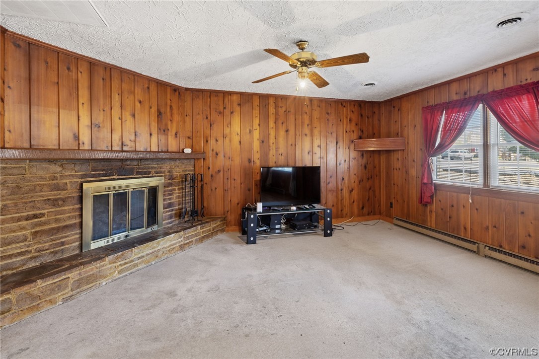 2408 Coxendale Road Chester, VA 23831 - Photo 8 of 26 a view of a livingroom with furniture and a fireplace