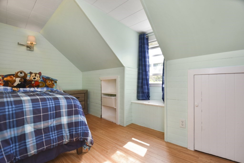 8 Deb Road Woburn, MA 01801 - Photo 23 of 34 a bedroom with a bed and window