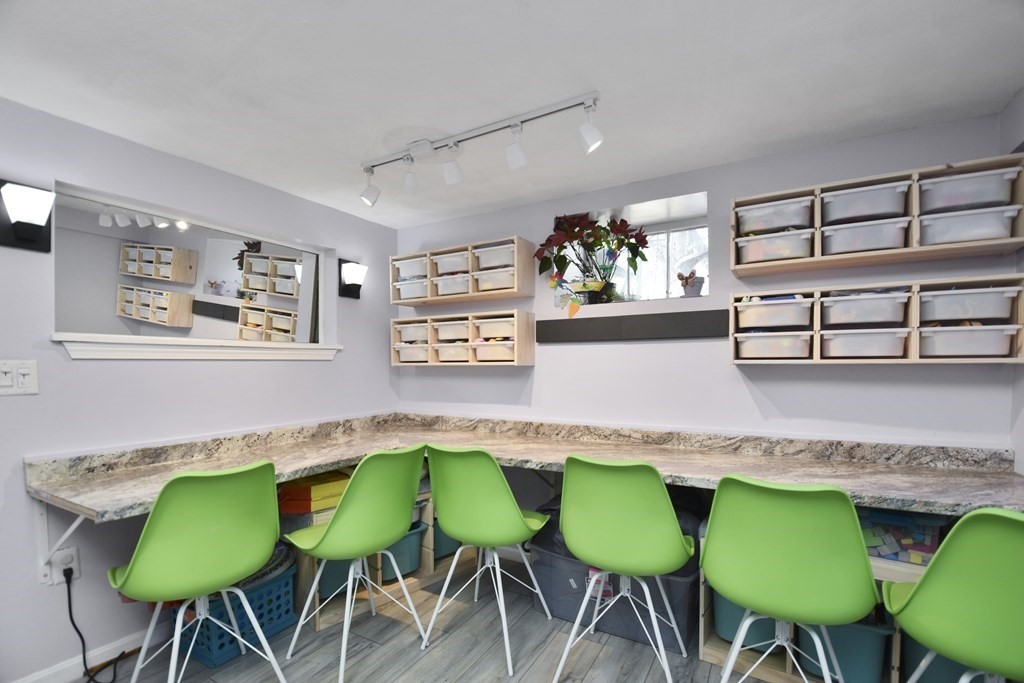 8 Deb Road Woburn, MA 01801 - Photo 25 of 34 a view of a dining room with furniture and wooden floor
