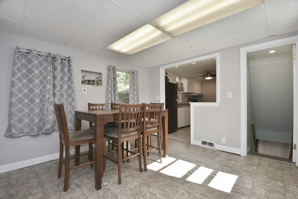 8 Deb Road Woburn, MA 01801 - Photo 4 of 34 a dining room with furniture and window