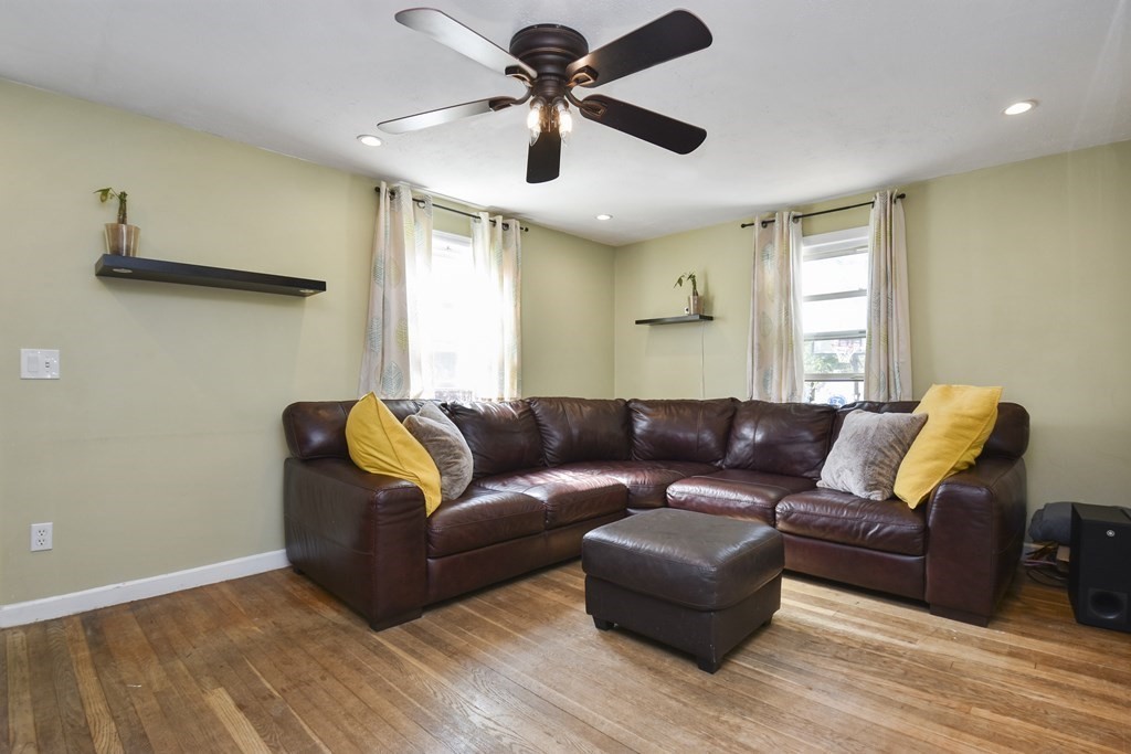 8 Deb Road Woburn, MA 01801 - Photo 6 of 34 a living room with furniture