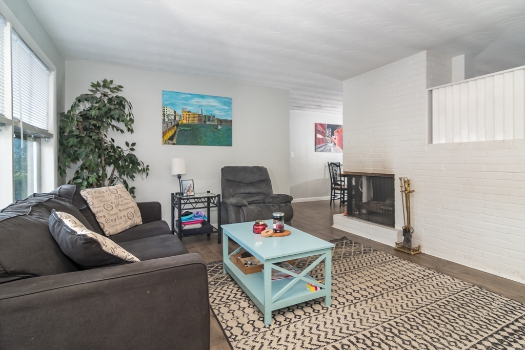 17 Francine Road Framingham, MA 01701 - Photo 3 of 14 a living room with furniture and a flat screen tv