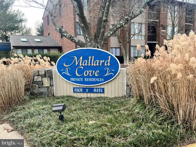 a sign on the side of the road