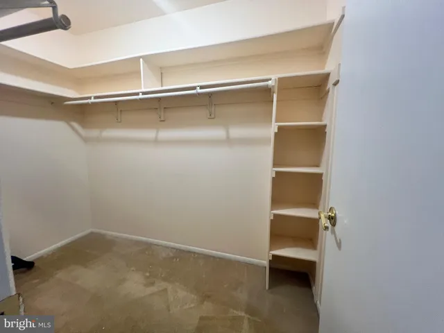a view of room with walk in closet