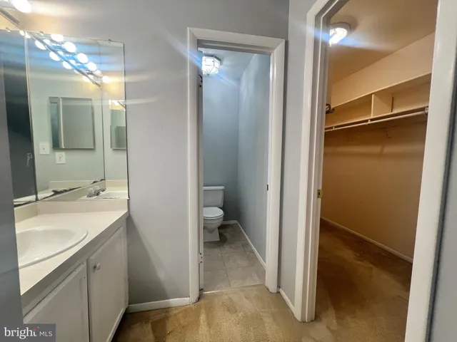 a view of a bathroom from a hallway