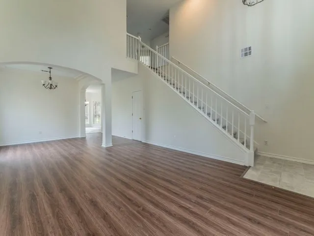 a view of entryway with wooden floor