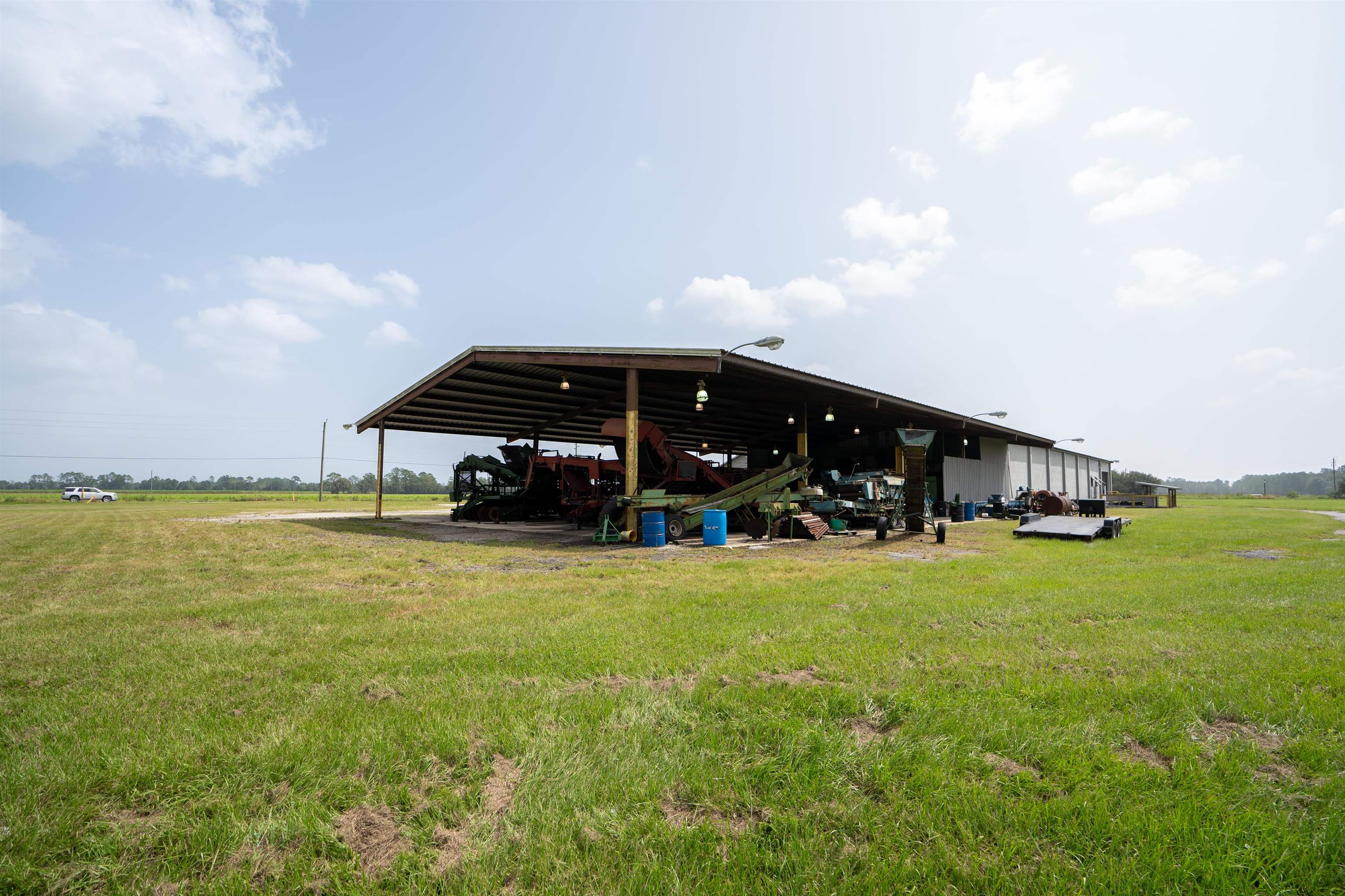 1105 County Road 13A Elkton, FL 32033 - Photo 11 of 57 a view of a house with a yard and sitting area