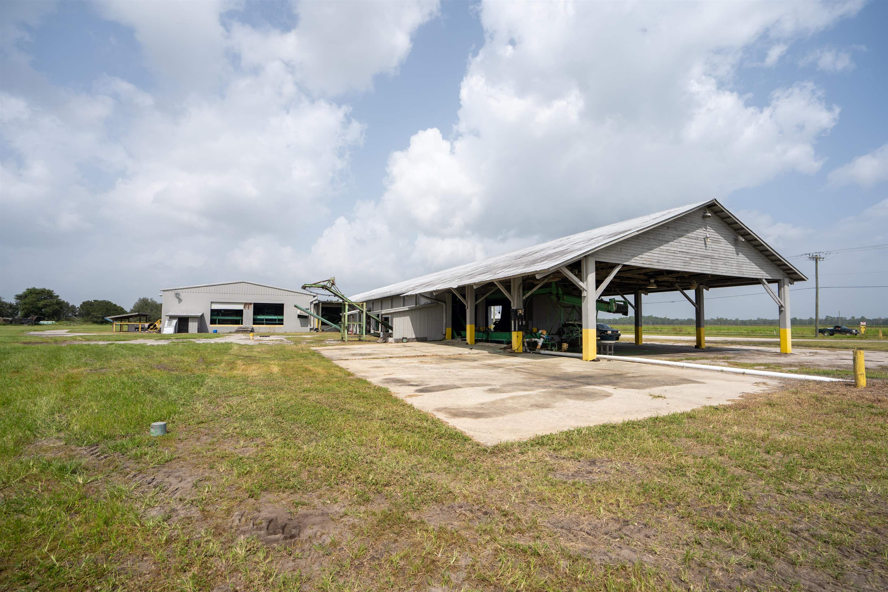1105 County Road 13A Elkton, FL 32033 - Photo 18 of 57 a front view of a house with yard