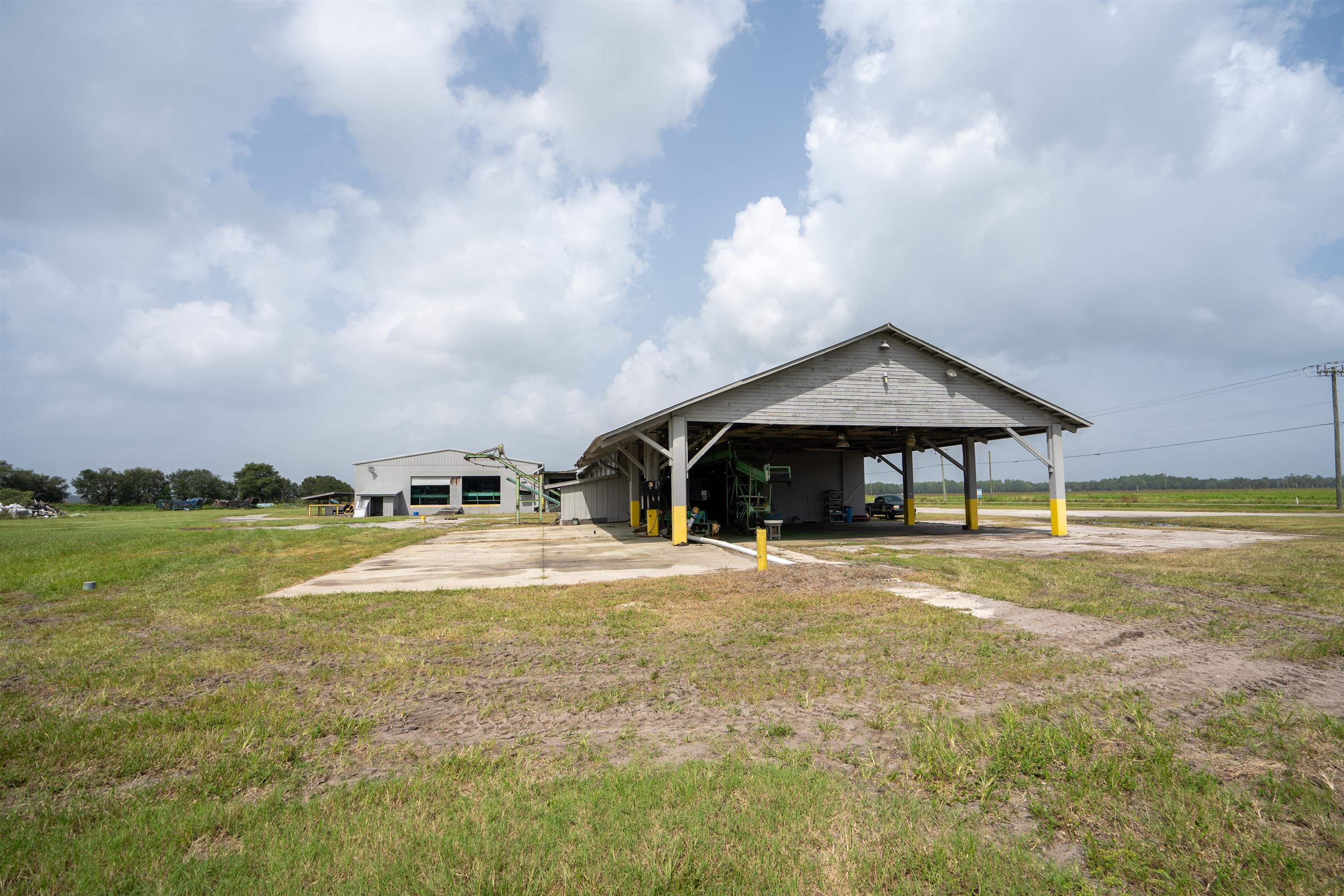 1105 County Road 13A Elkton, FL 32033 - Photo 19 of 57 a view of a house with pool and a yard