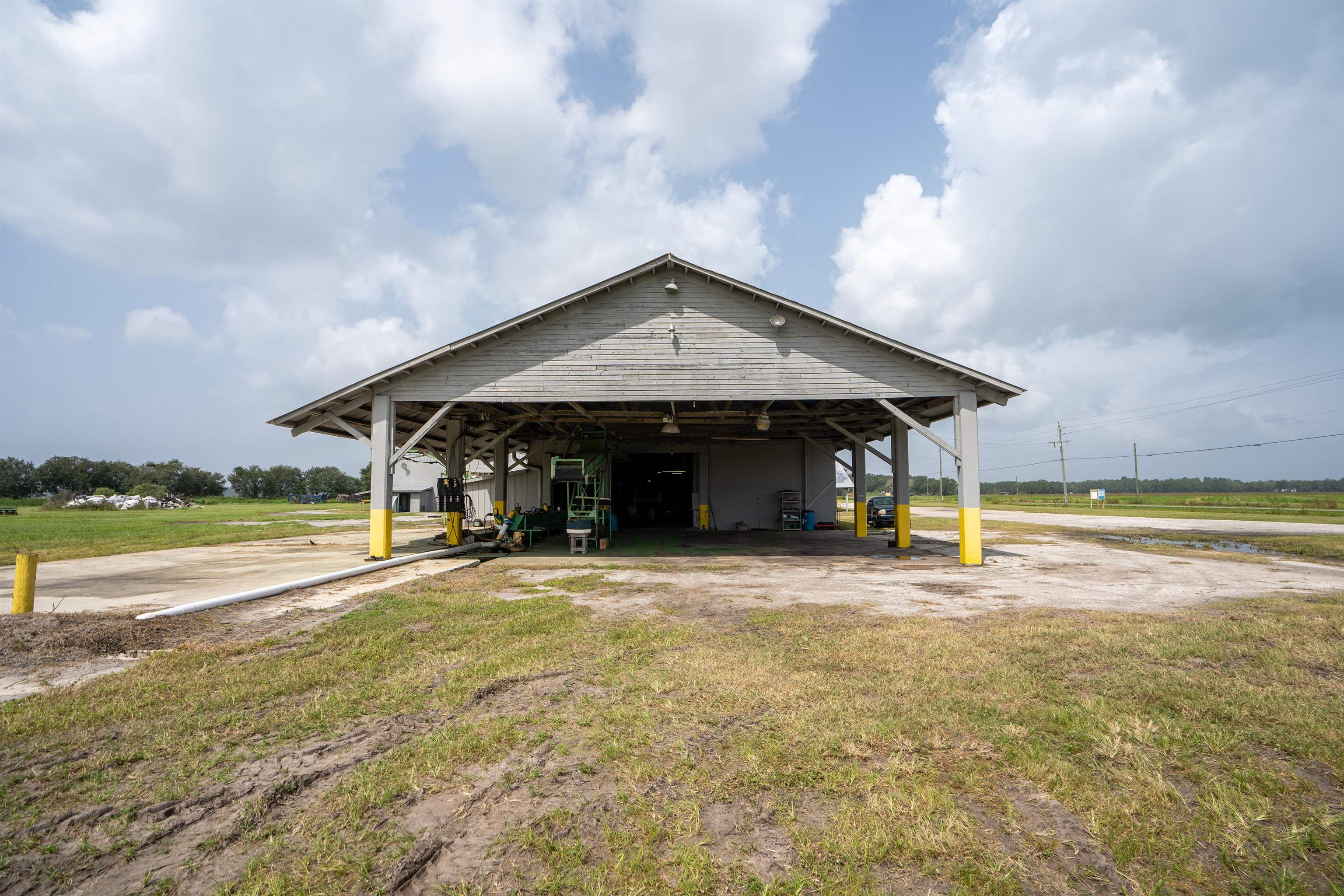 1105 County Road 13A Elkton, FL 32033 - Photo 20 of 57 a view of a house with swimming pool and sitting area