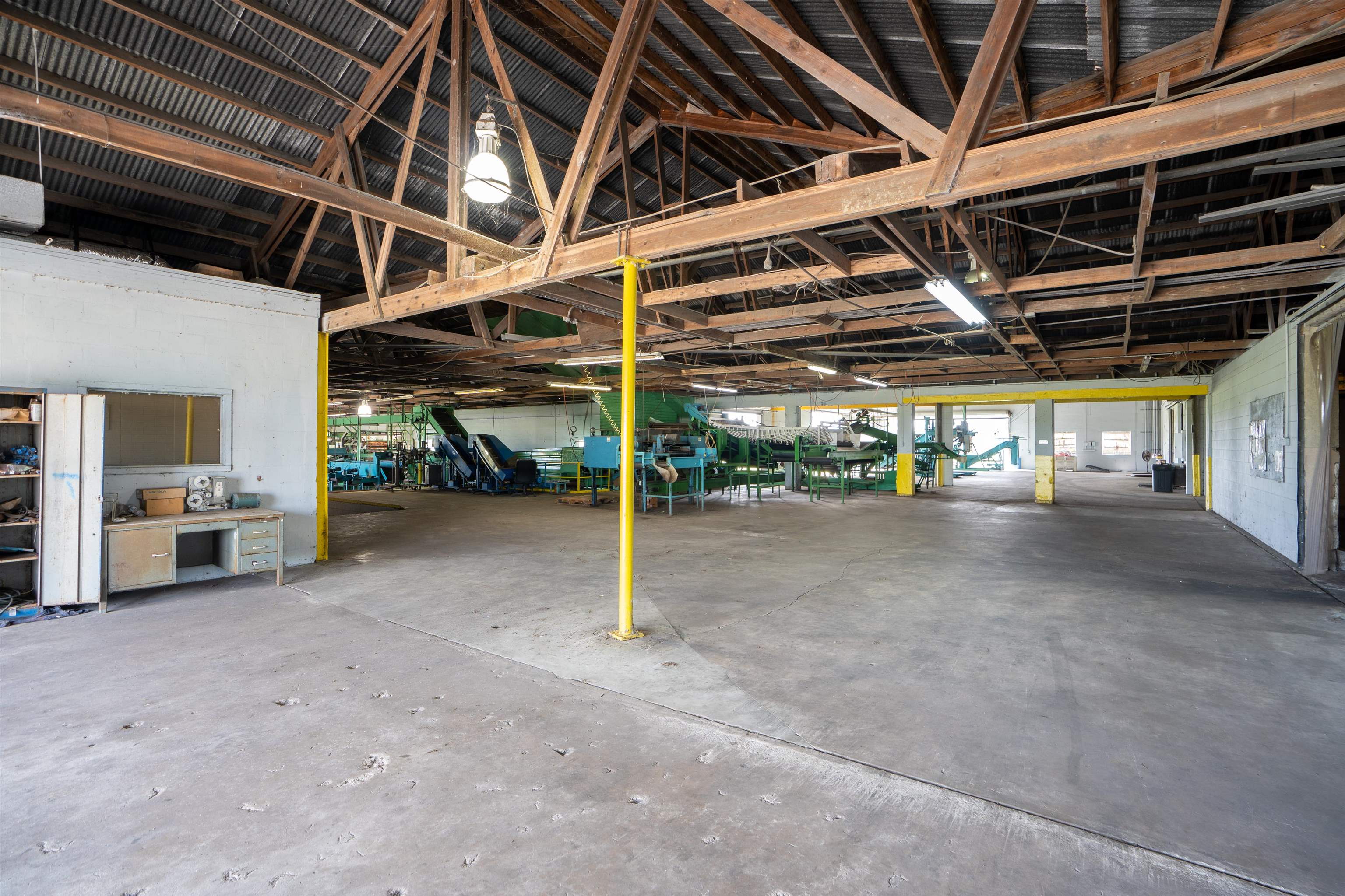 1105 County Road 13A Elkton, FL 32033 - Photo 38 of 57 a view of a garage with wooden table and chairs