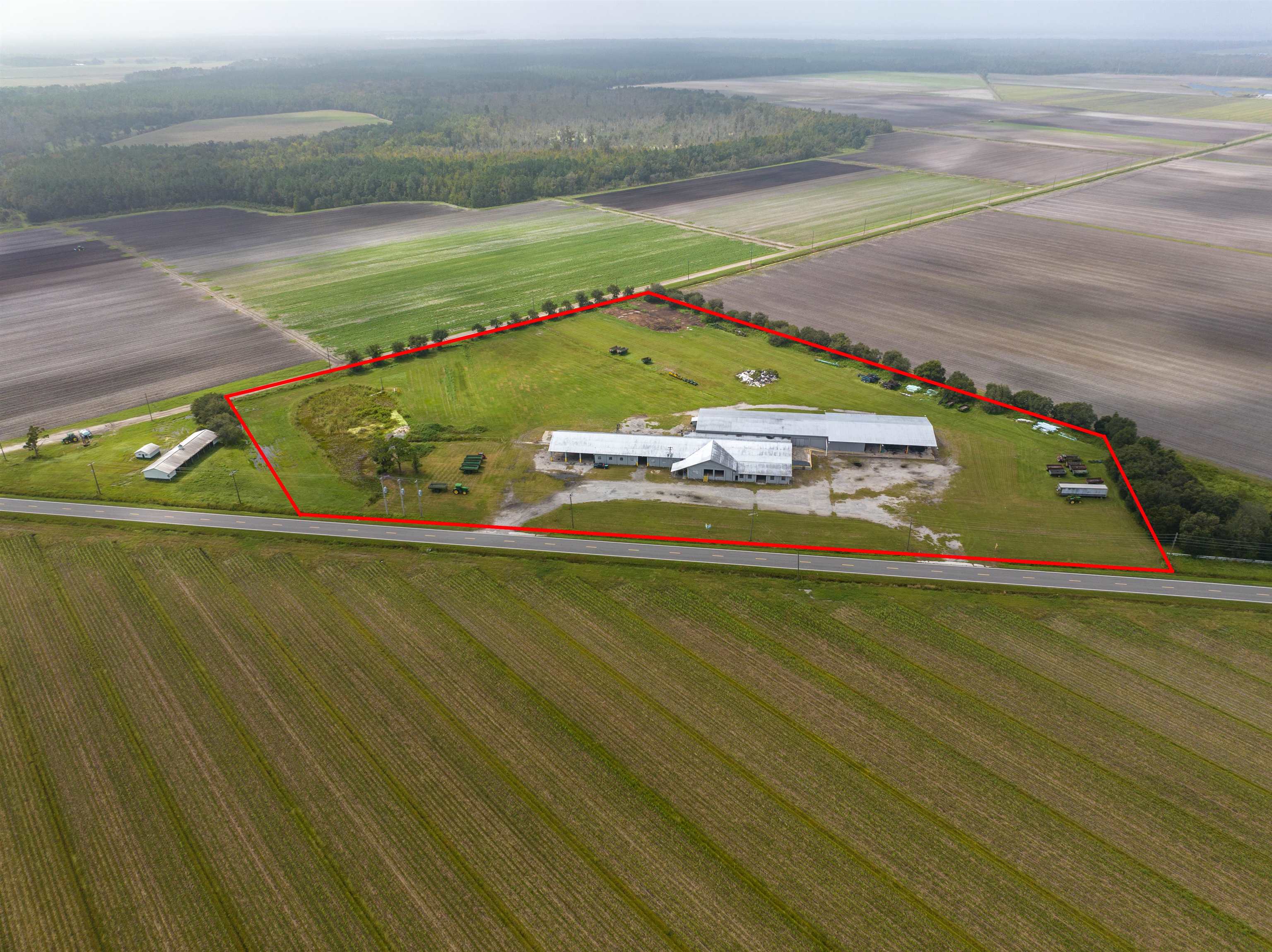 1105 County Road 13A Elkton, FL 32033 - Photo 55 of 57 a view of a pool with a yard