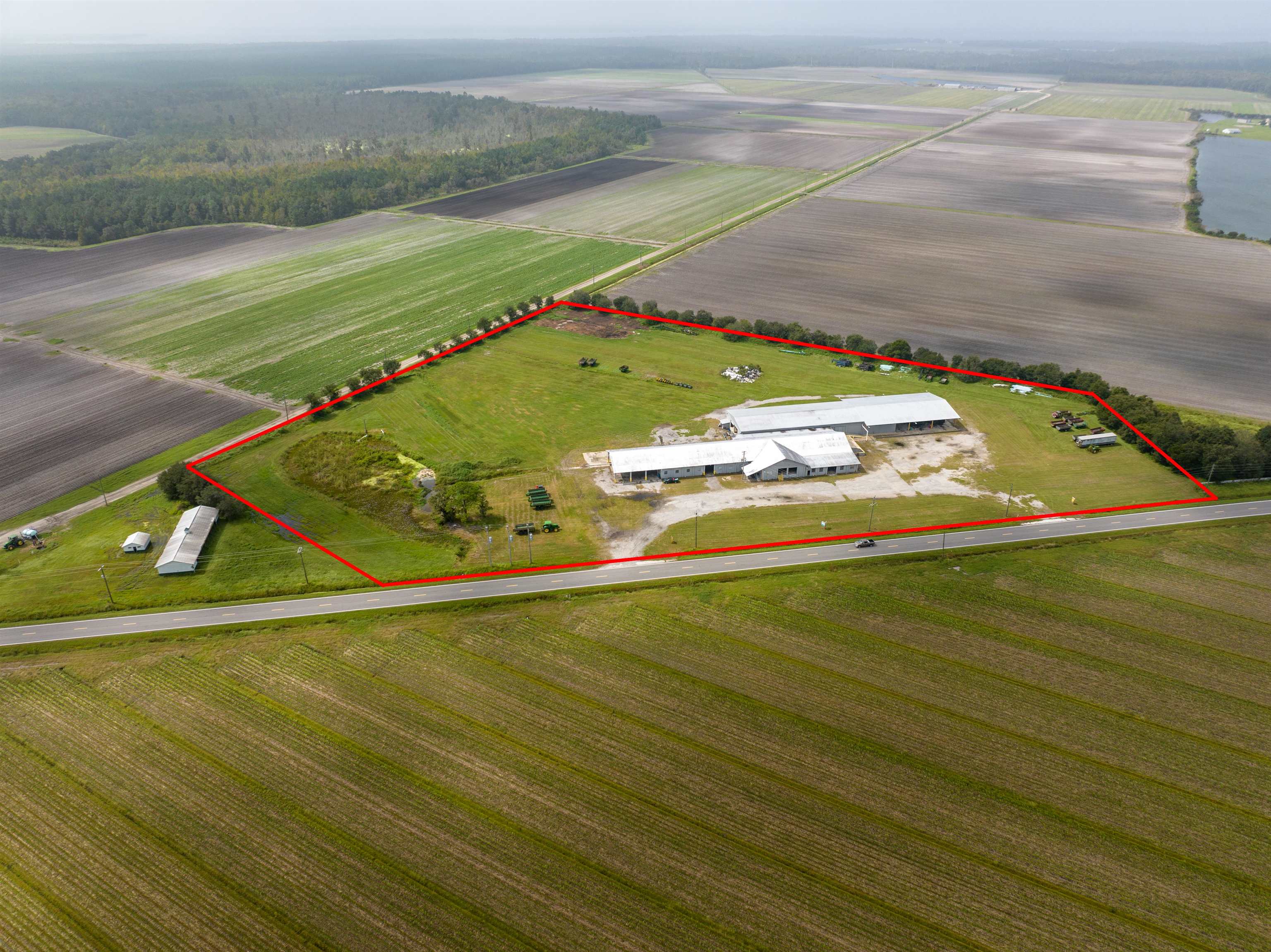 1105 County Road 13A Elkton, FL 32033 - Photo 56 of 57 a view of an outdoor space and tennis court