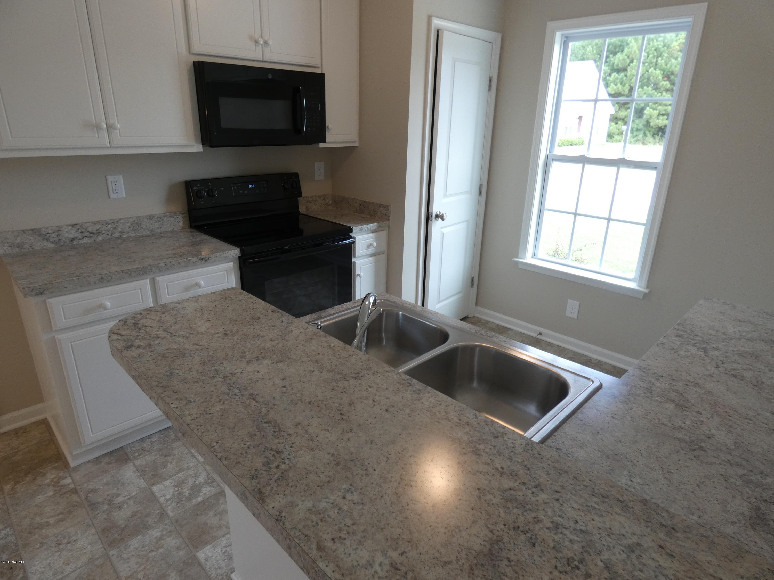 1977 Sapphire Road Rocky Mount, NC 27804 - Photo 8 of 22 1977 Sapphire Rd. Kitchen Bar