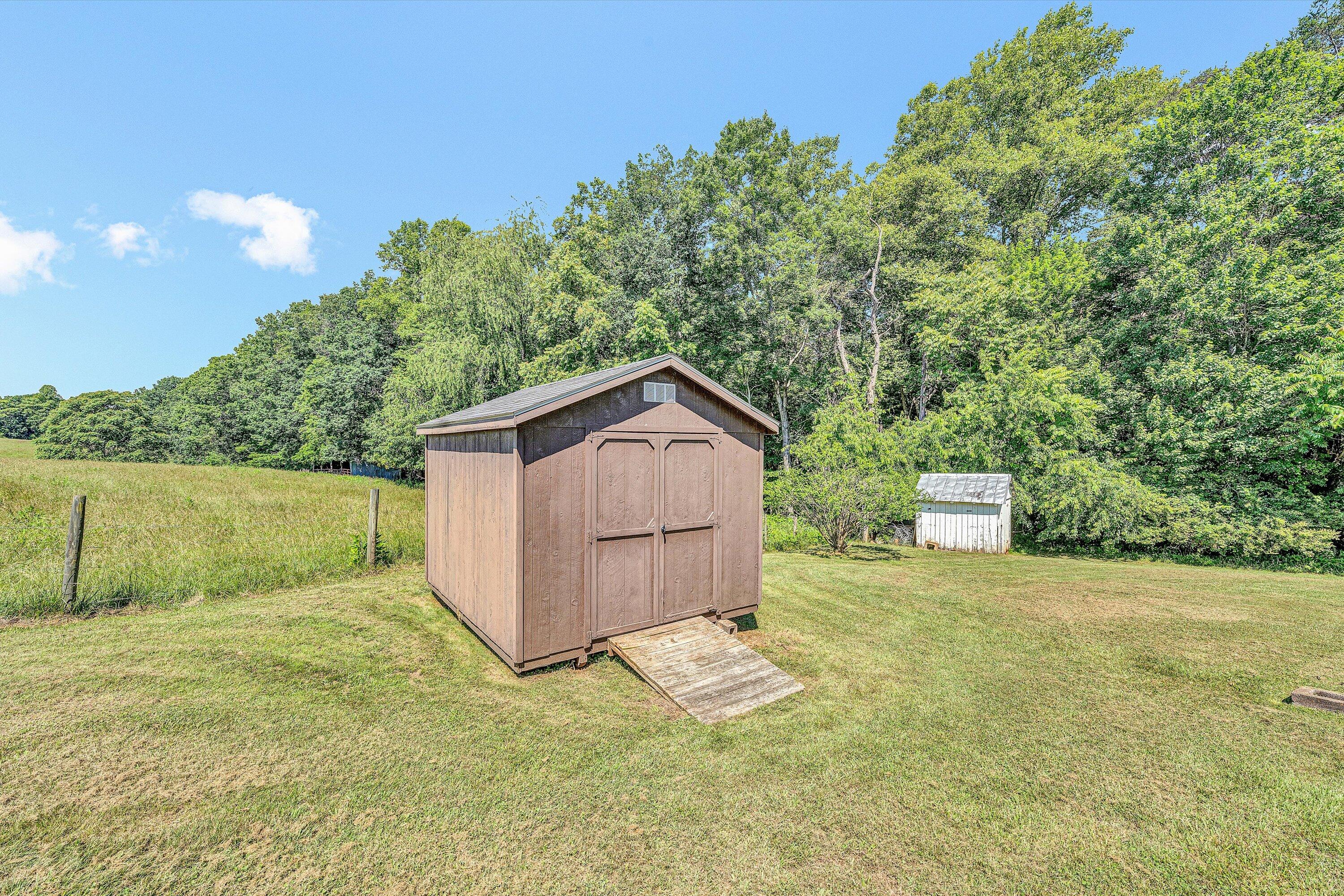 20083 Snow Creek Road Penhook, VA 24137 - Photo 21 of 31 Storage Shed with Electricity
