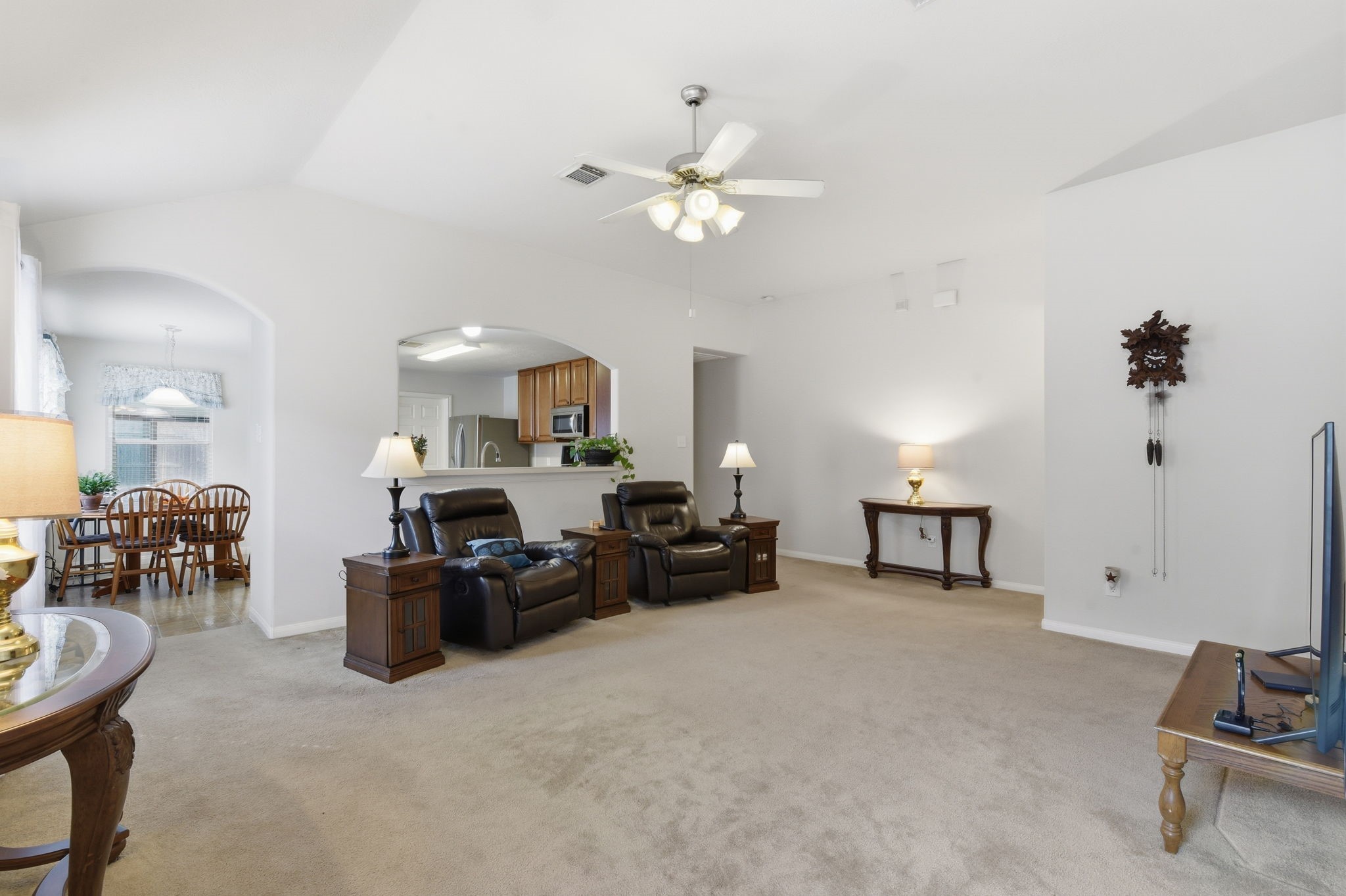 21639 Falvel Misty Drive Spring, TX 77388 - Photo 4 of 11 a living room with furniture and a chandelier