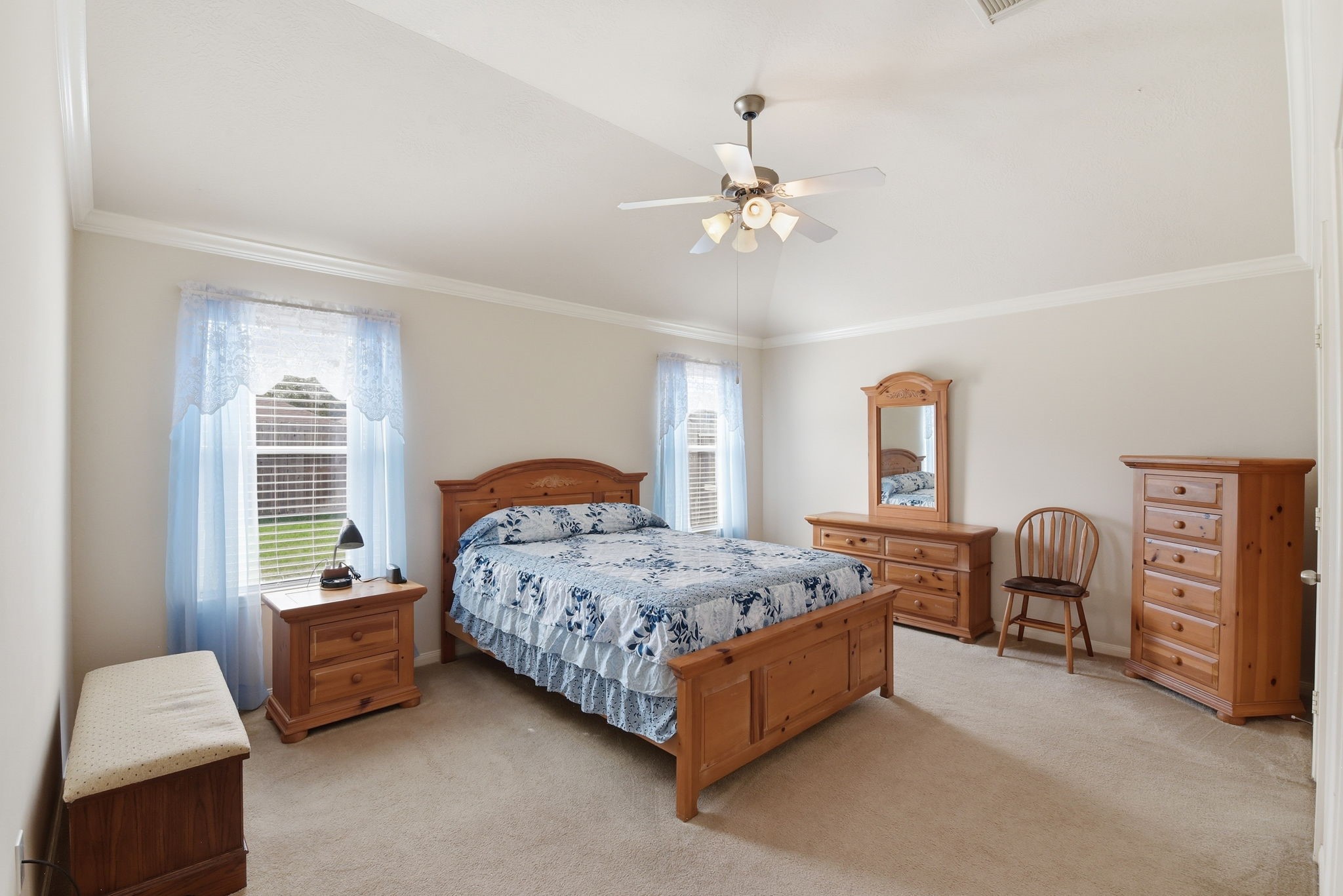 21639 Falvel Misty Drive Spring, TX 77388 - Photo 7 of 11 a bedroom with a bed couch and a window