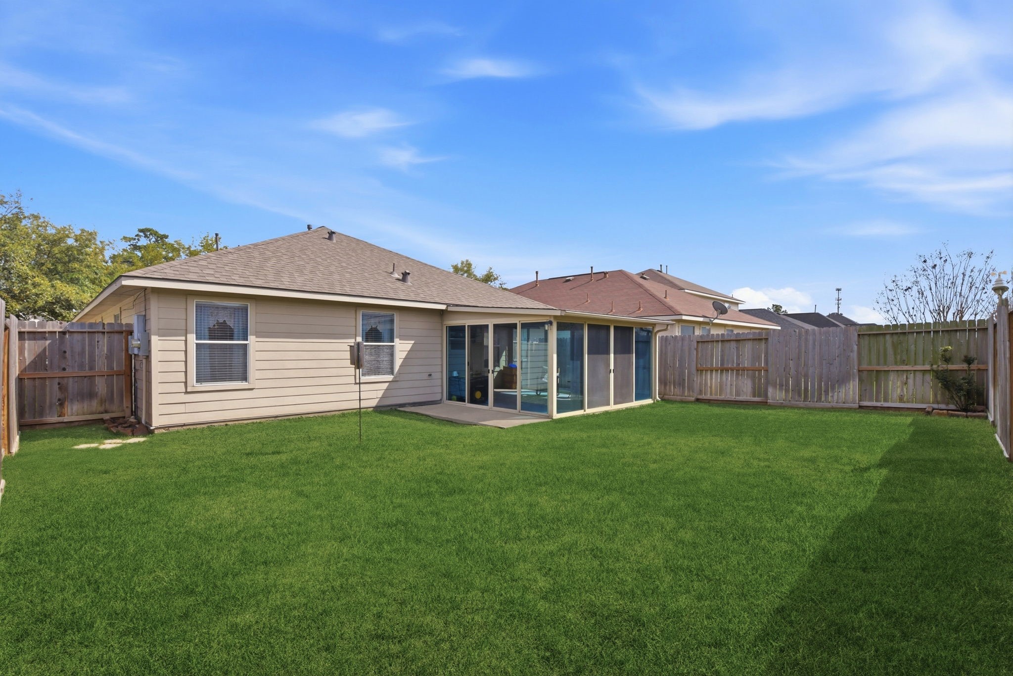 21639 Falvel Misty Drive Spring, TX 77388 - Photo 10 of 11 a front view of a house with yard porch and green space