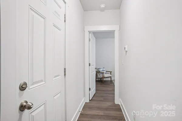 a view of a bathroom from the hallway