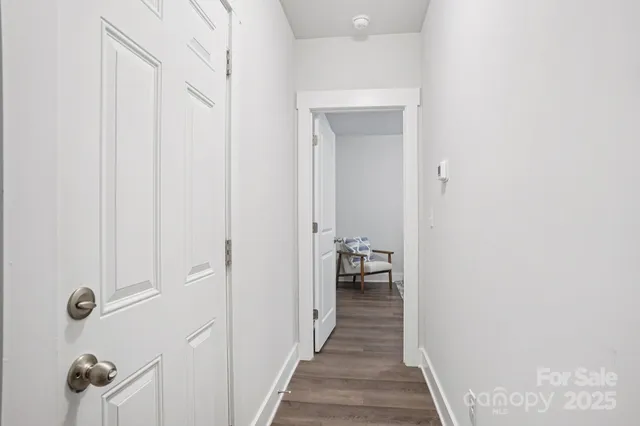 a view of a bathroom from the hallway