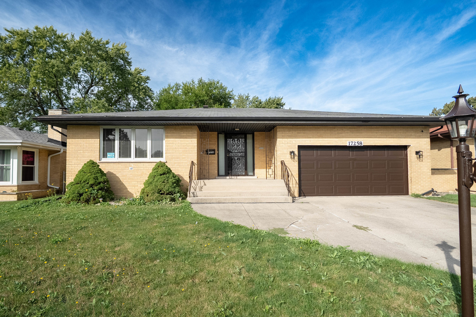 a view of front door and yard