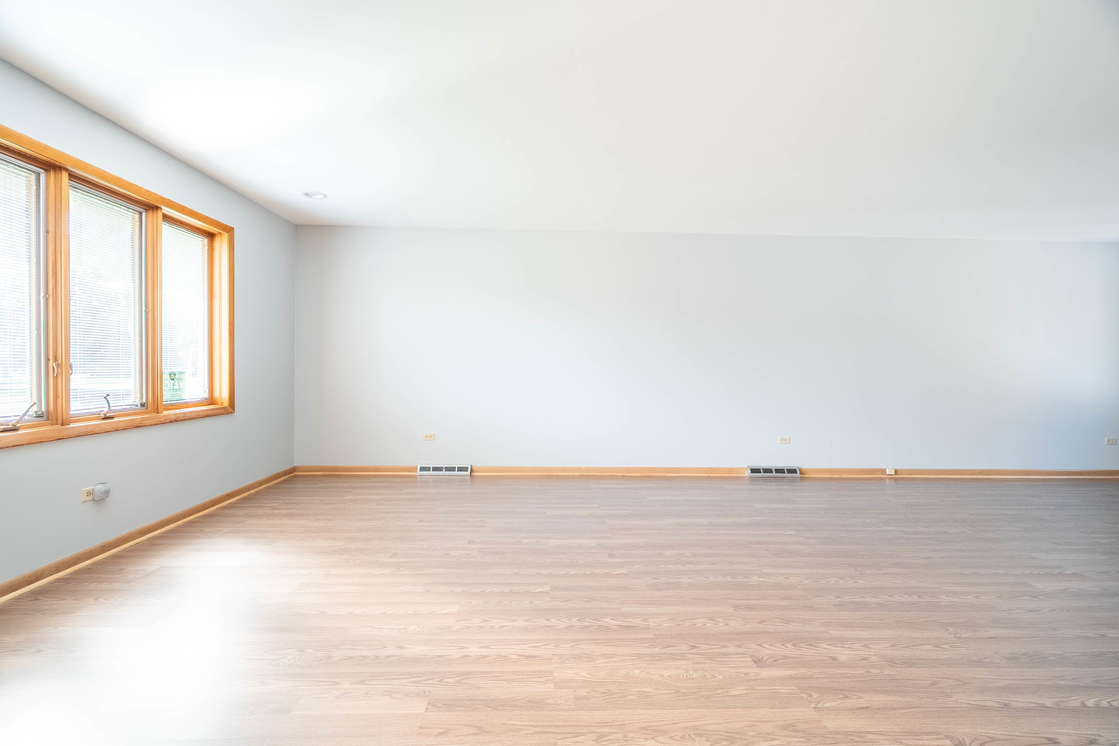 17258 William Street Lansing, IL 60438 - Photo 21 of 34 a view of an empty room with a window