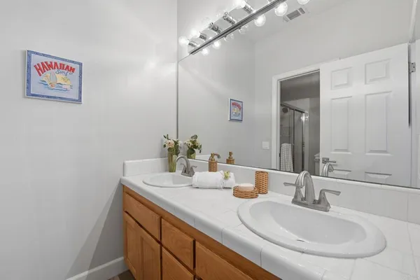 a view of a lake with a house in the background