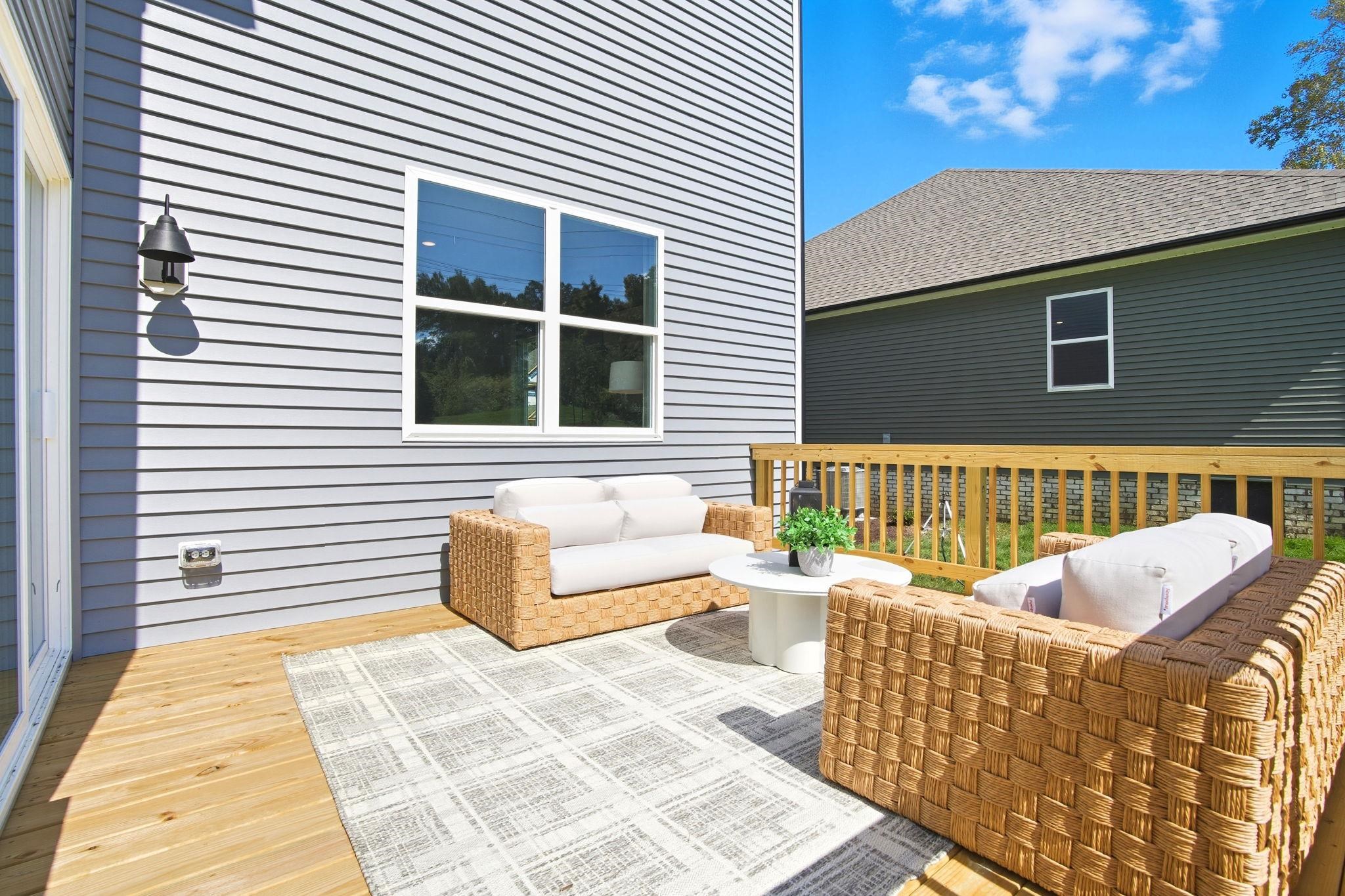 113 Meadow Ridge Way Staunton, VA 24401 - Photo 30 of 30 a balcony with furniture and wooden floor