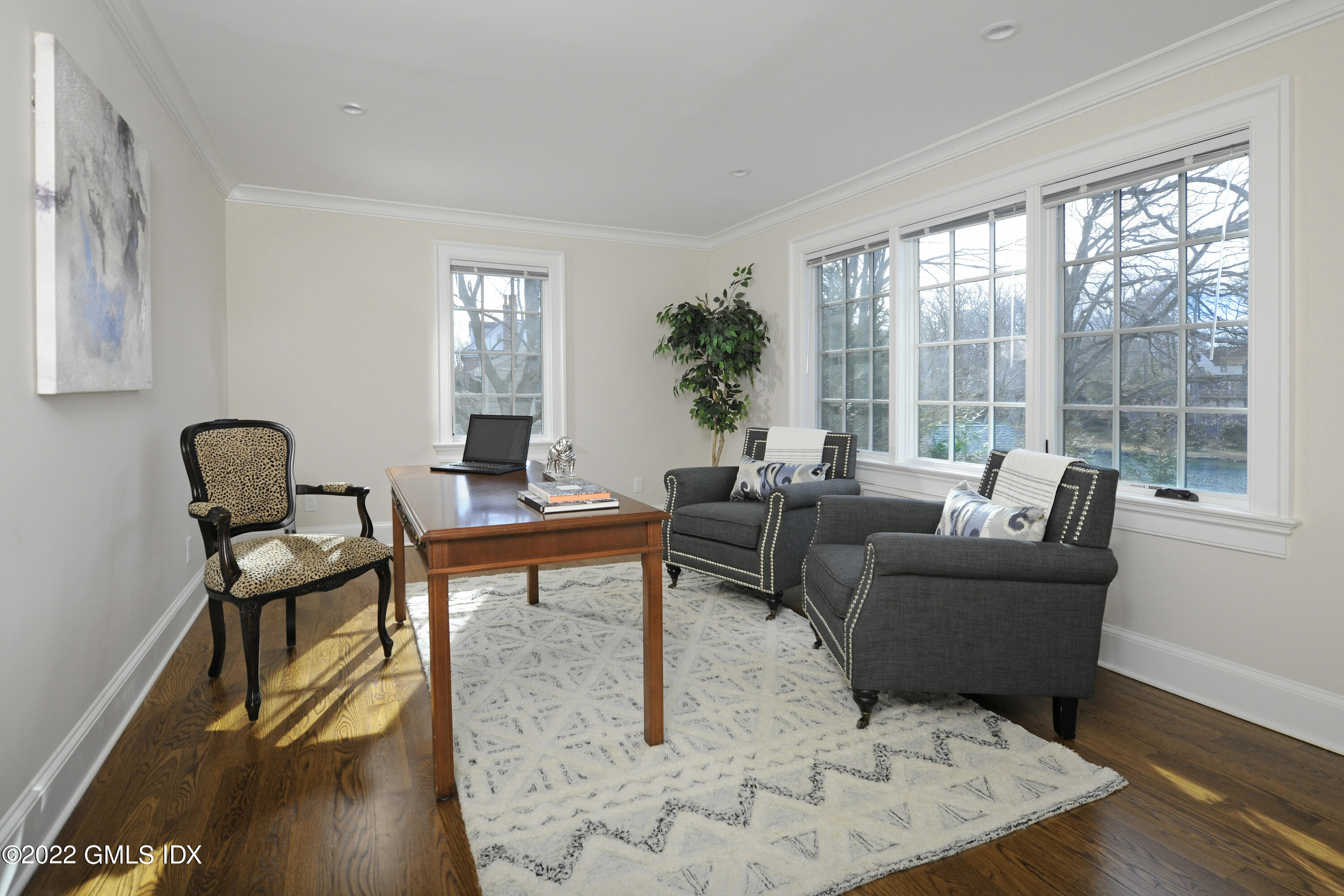 113 Woodside Drive Greenwich, CT 06830 - Photo 13 of 37 a living room with furniture and a window