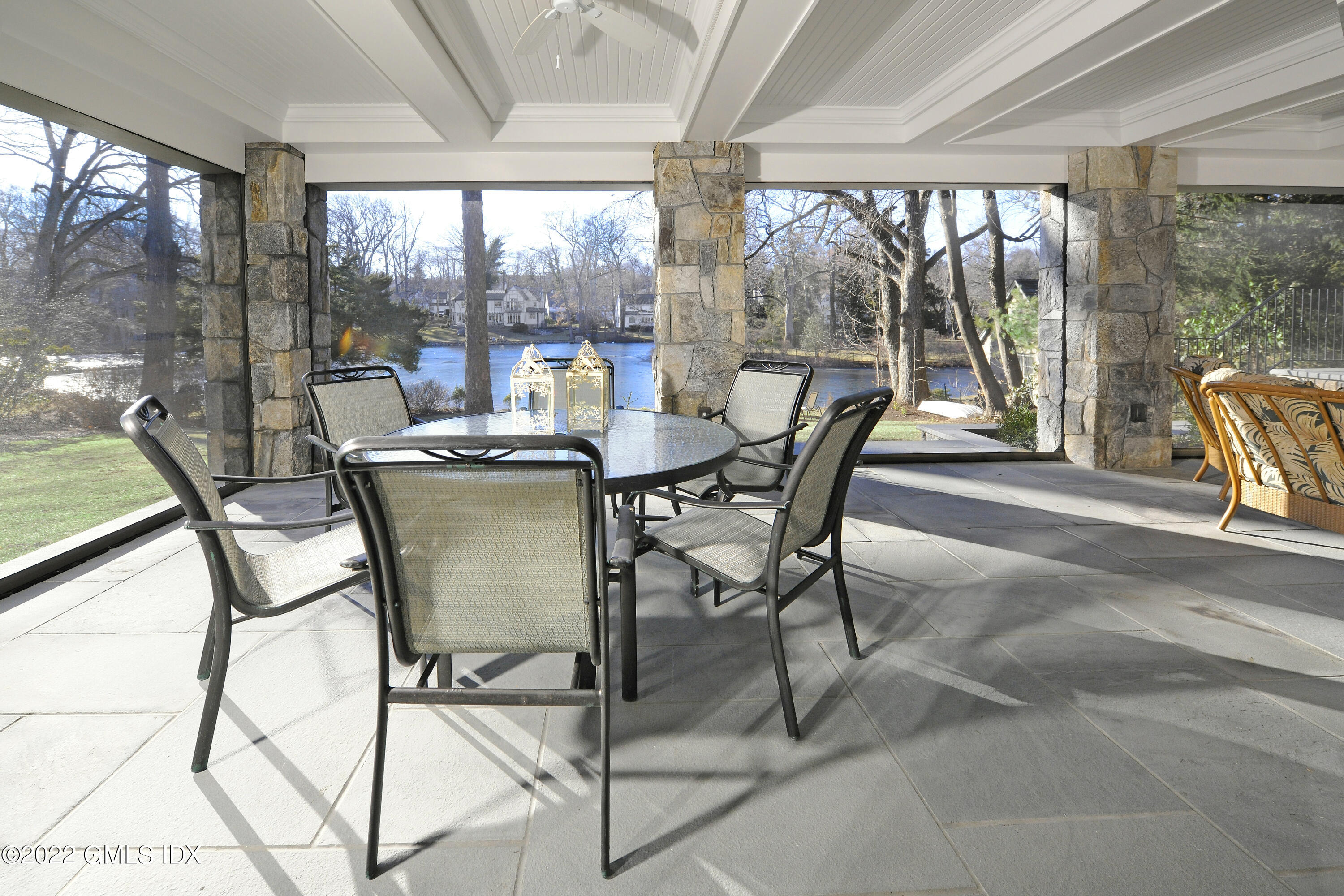 113 Woodside Drive Greenwich, CT 06830 - Photo 31 of 37 a dining room with furniture and garden view