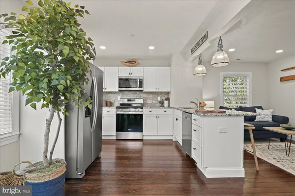 a living room with a couch and a table