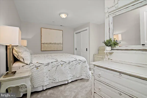 a view of a chair and table in the balcony