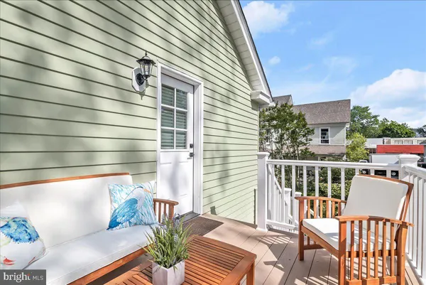 a kitchen with stainless steel appliances granite countertop a stove microwave and refrigerator